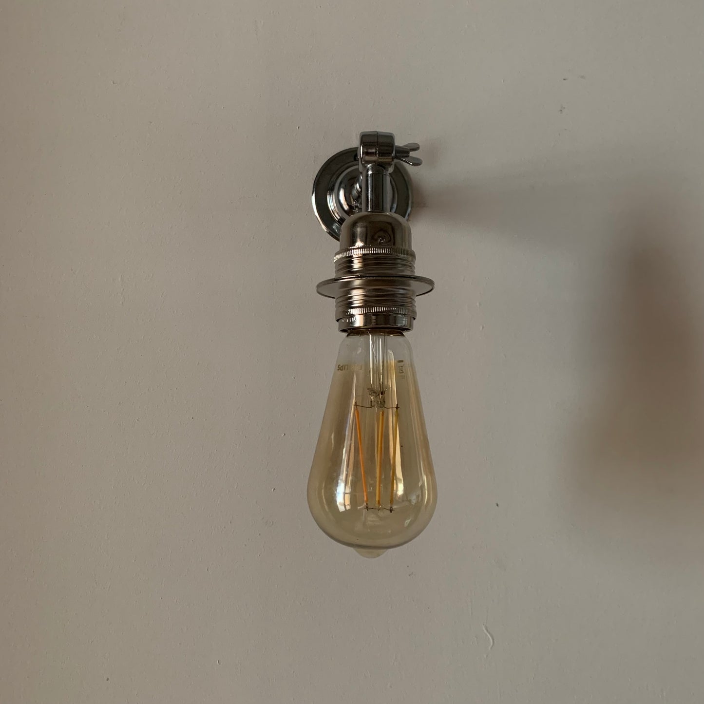 Metal ceiling or wall lamp silver, solid retro knuckle.