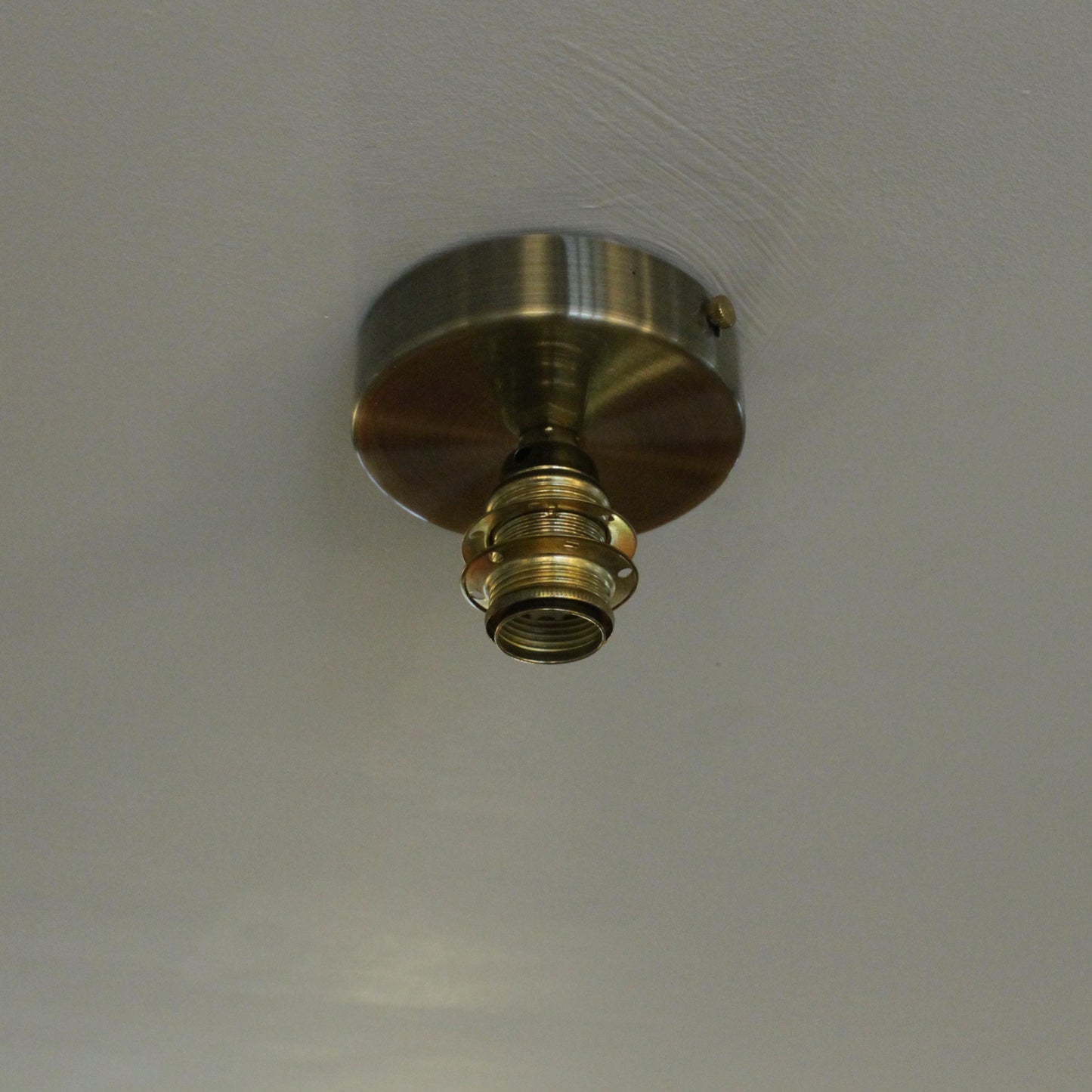 Flush ceiling light fitting
