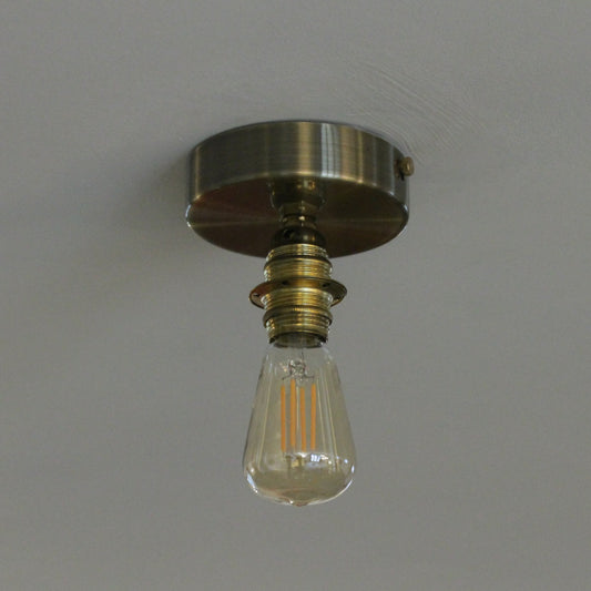 Flush ceiling light fitting