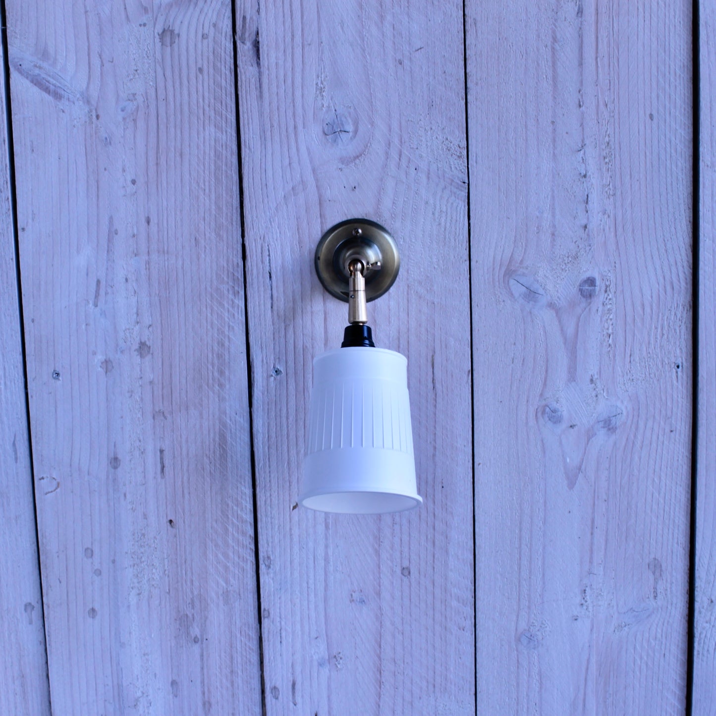 Noodle wall lamp with tilt