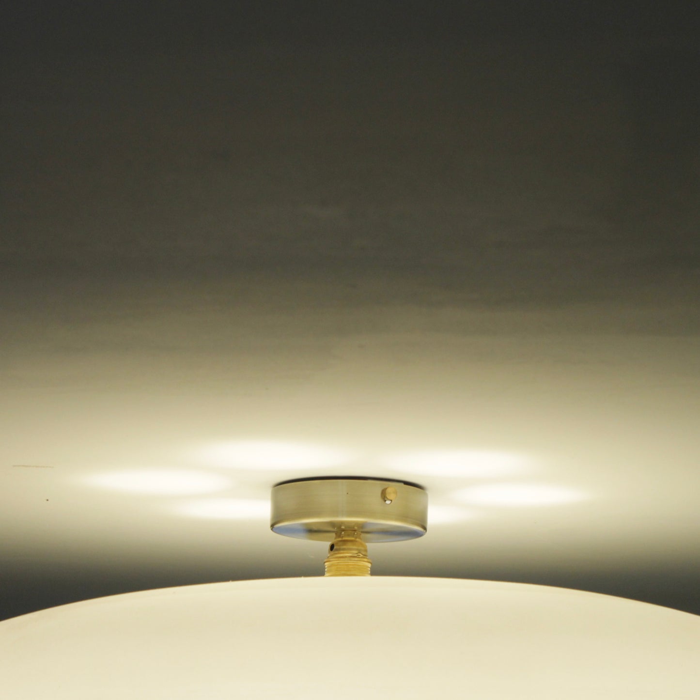 Flush ceiling light fitting